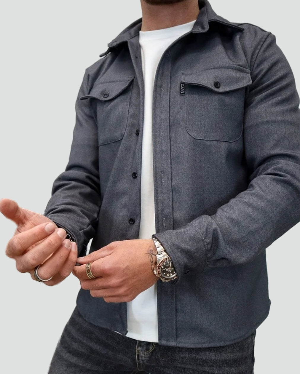 Men's Polo with Flap Chest Pockets and Button Cuffs