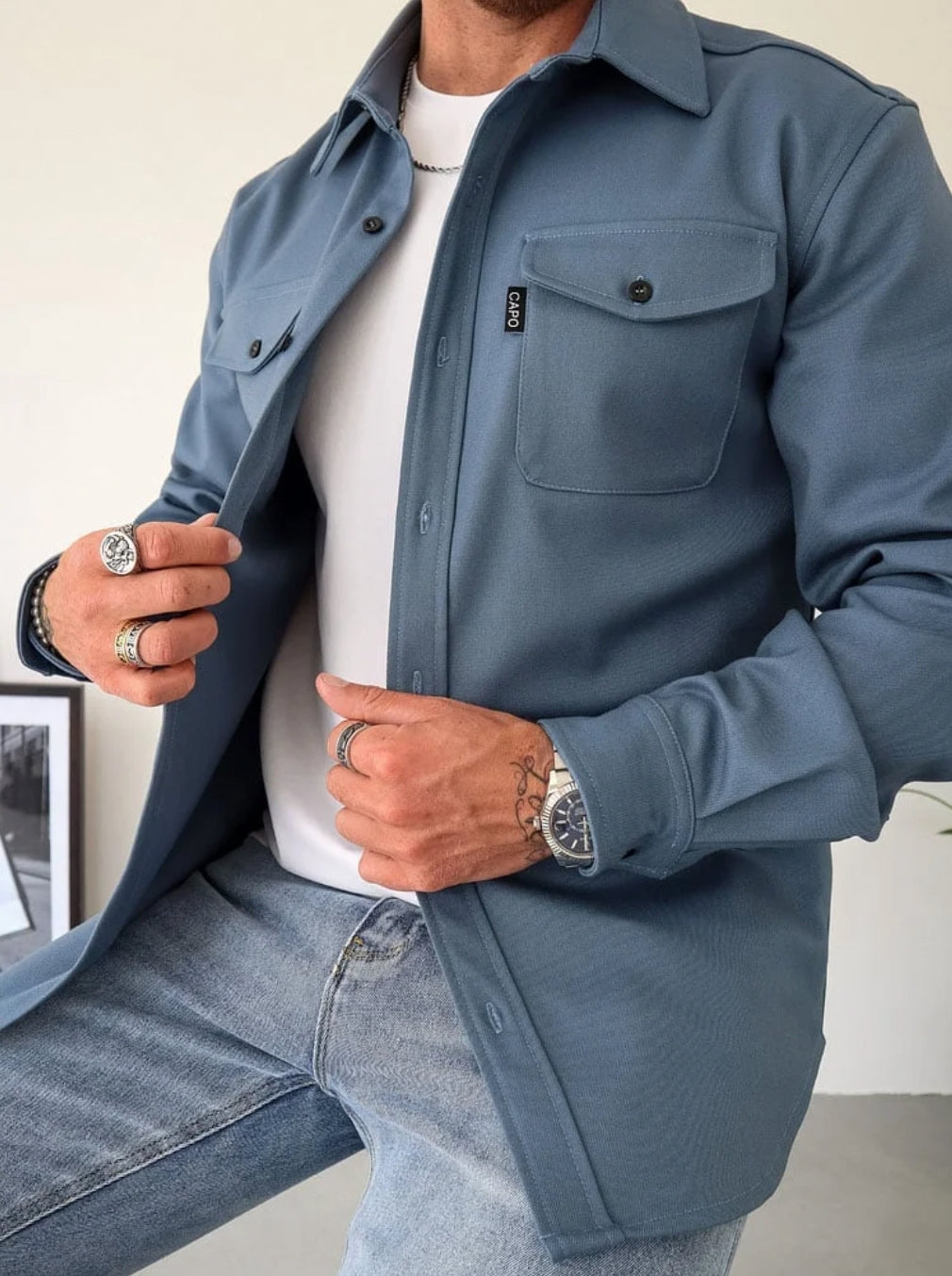 Men's Polo with Flap Chest Pockets and Button Cuffs